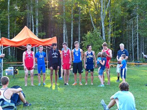 The boys' individual medal winners (it was Medomak's homecoming weekend, hence the medals), with Eli in 7th, Caleb in 4th, and Ben T. with a commanding lead for first.   