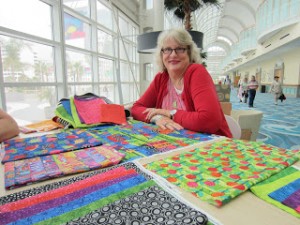 Jamie at Quilt Market getting a first look at her fabric line!  How cool is that? 