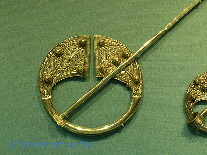 Just LOOK at this amazing ring pin; this one is probably almost 4 inches in diameter, and that pin could be lethal!