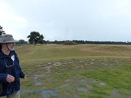 Our guide and some of the mounds in the burial grounds.