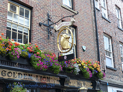 On the way to the minster, we passed yet another pub with glorious flowerboxes and a wonderful sign.