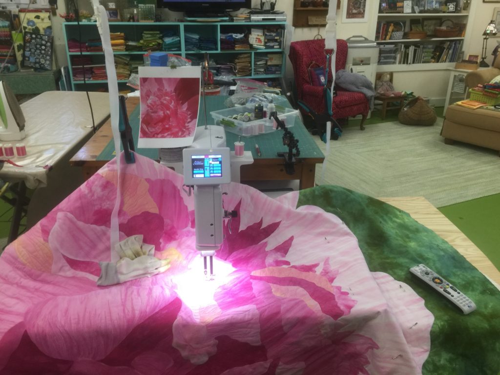 Working on the lighter petals on the big peony quilt. It will finish about 45x55 I think.....depends on how much I trim off and/or turn to the back. 