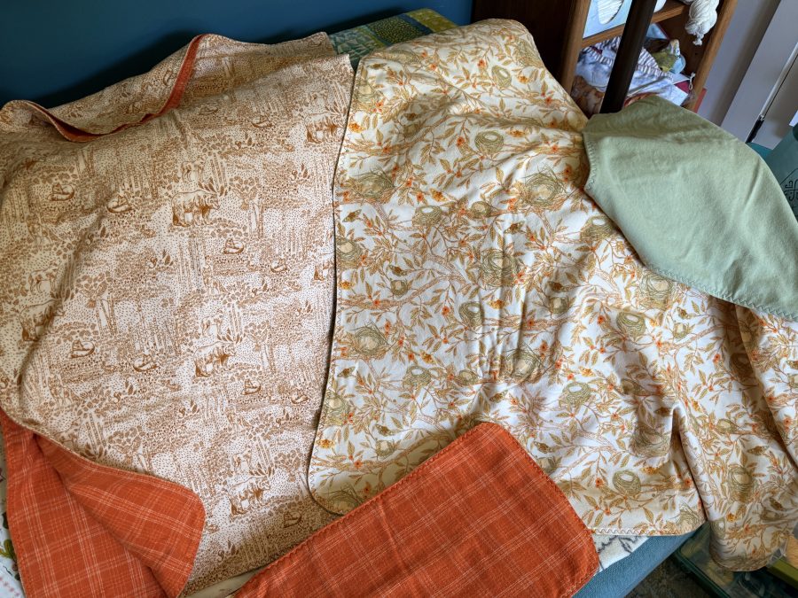 A close-up of the burp cloths