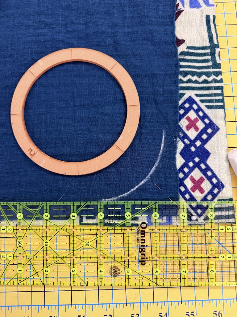 Use a template, dish or big can to mark a curve that aligns with the seemliness.